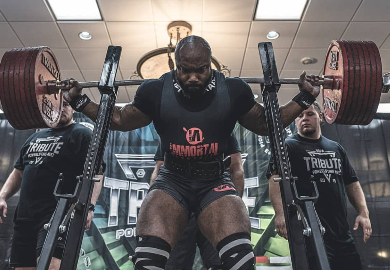 trainee wearing belt for squats